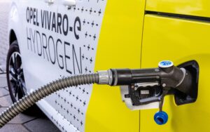 A photo of a a Hydrogen powered Opel Vivaro-e being filled up.