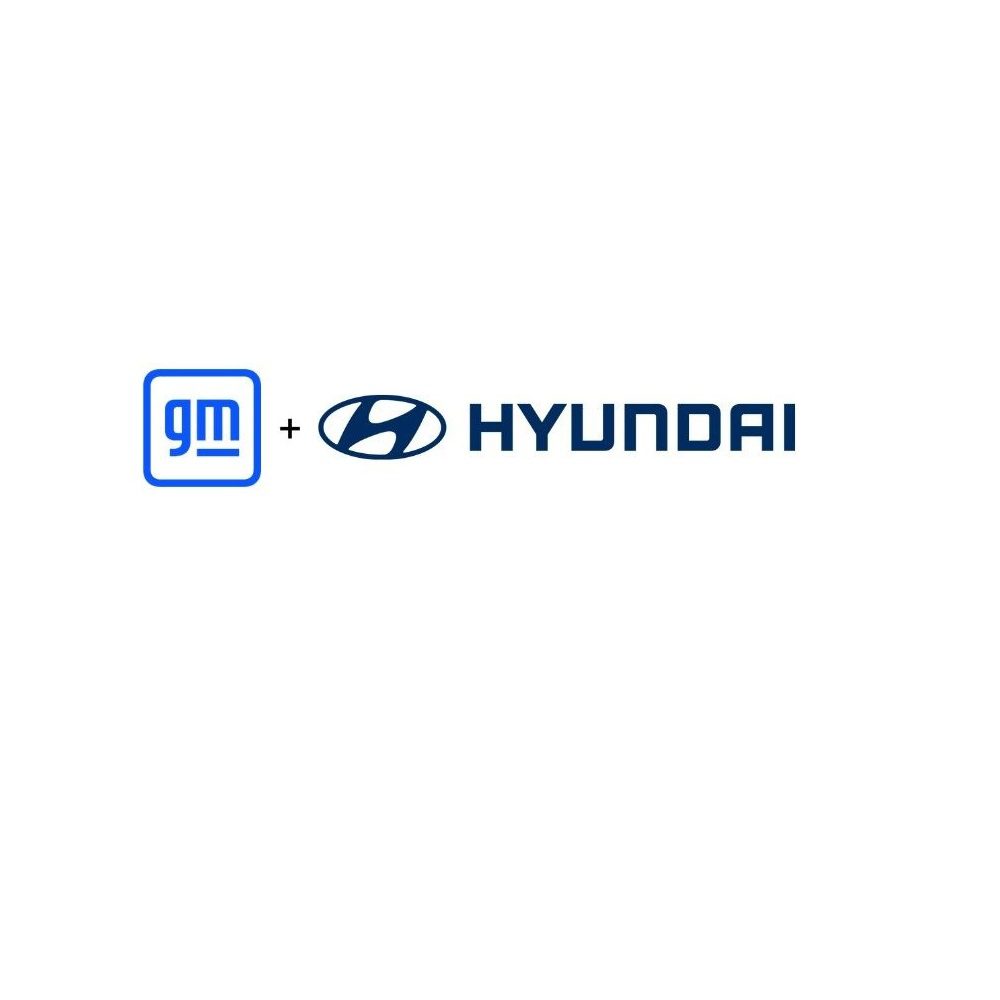 A photo showing the logos of General Motors (GM) and Hyundai on a white background.