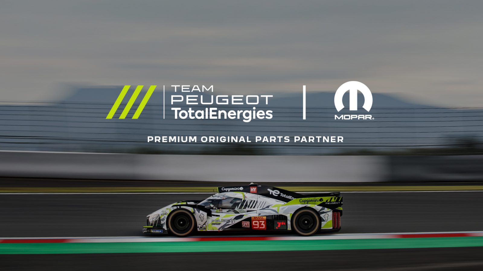 Side on view of a Peugeot Sport 9X8 hypercar in motion.