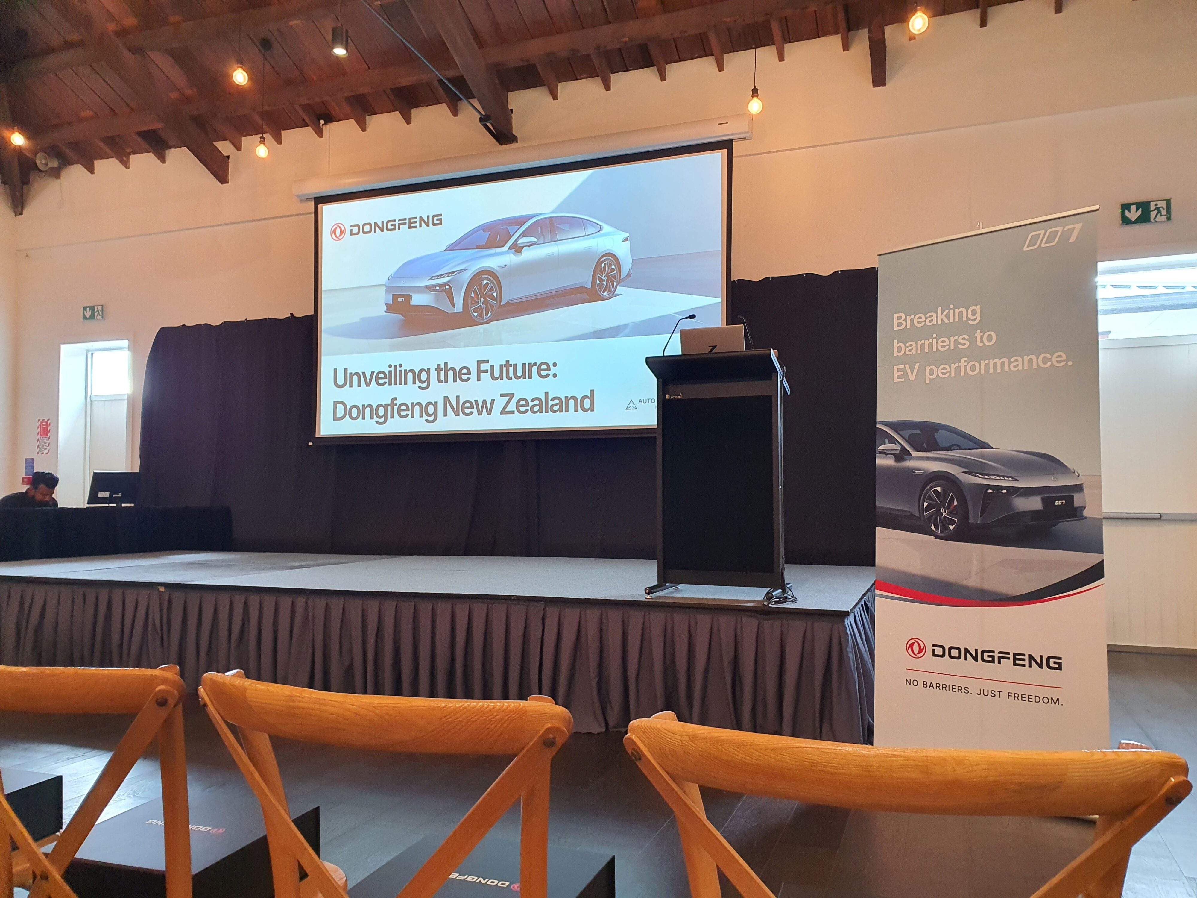 A photo of the presentation stage at the 2025 New Zealand launch of the Dongfeng Motors brand and Box EV.