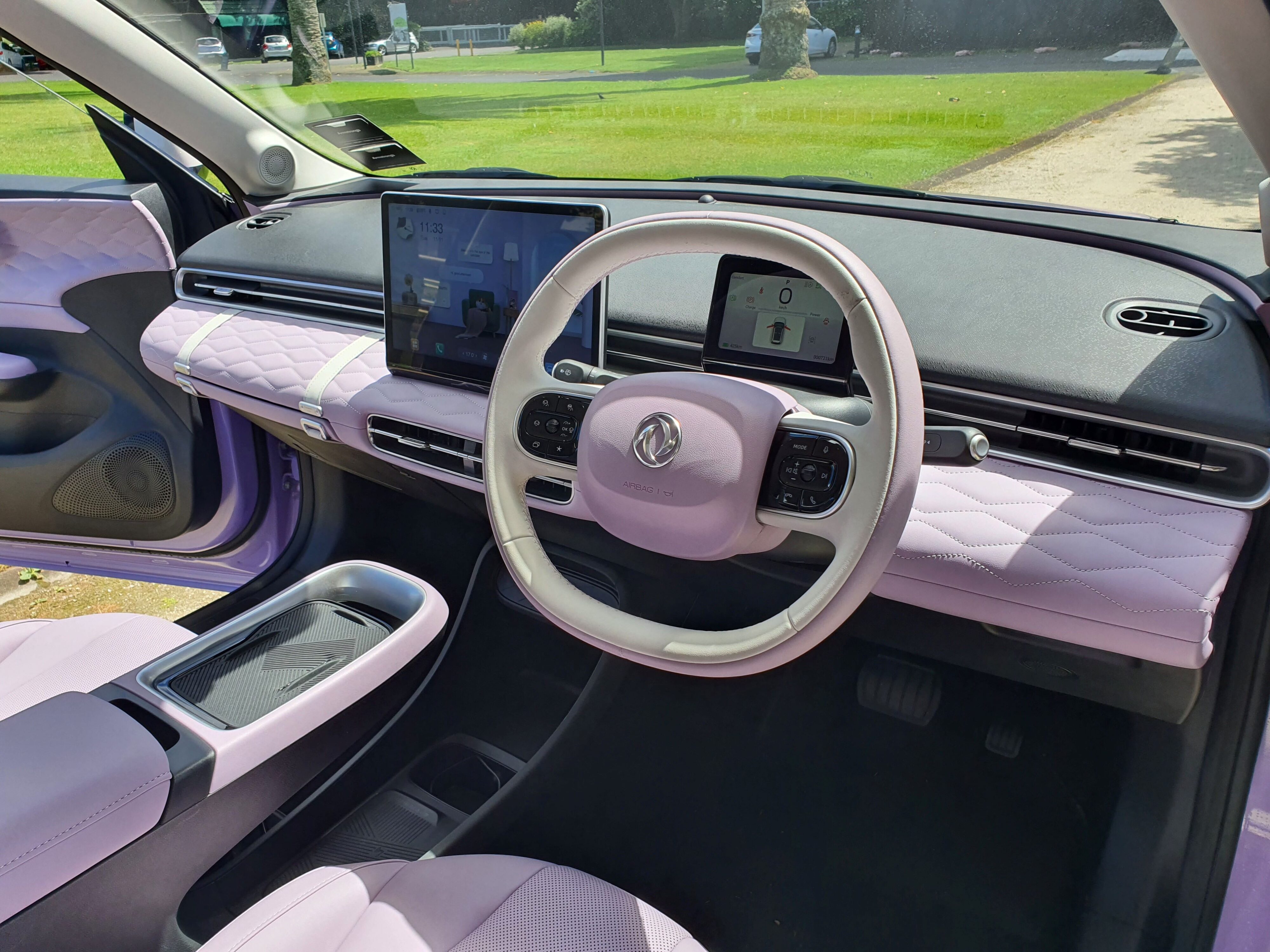 A photo of the pink and white interior of a 2025 Dongfeng Box.