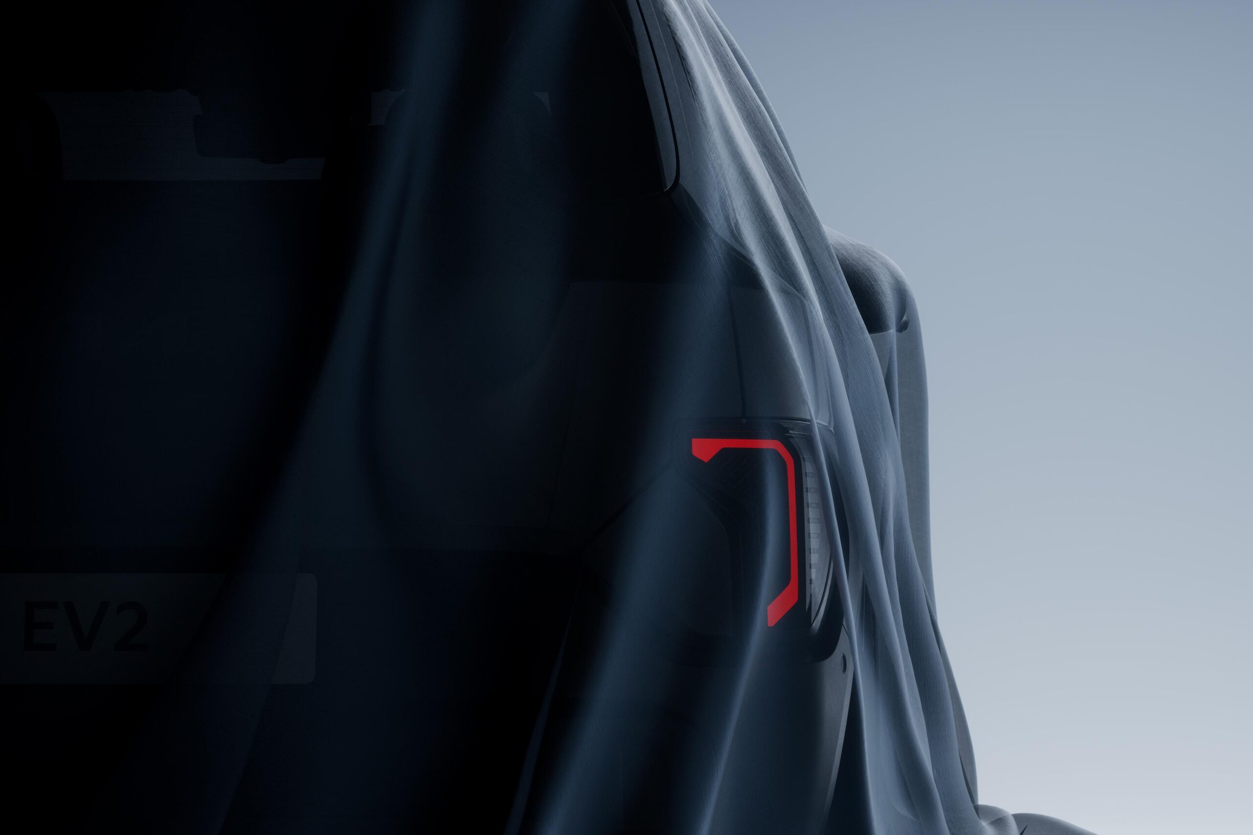 Rear on view of a Kia EV2 taillight under covers.