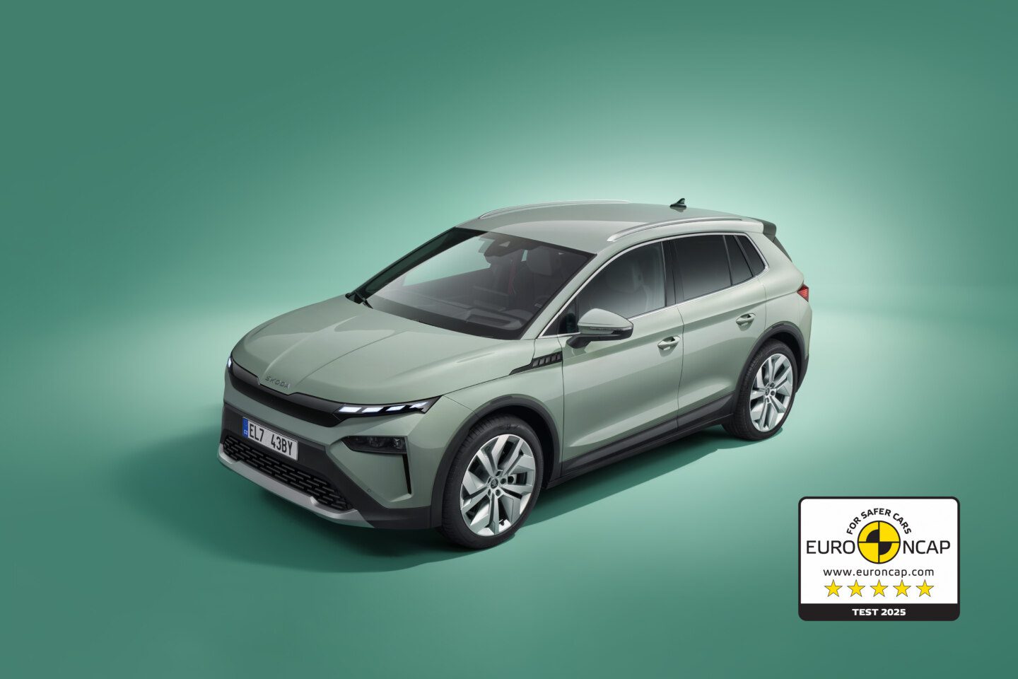 A promotional photo of the Skoda Elroq with a badge showing its Euro NCAP 5-star safety rating.