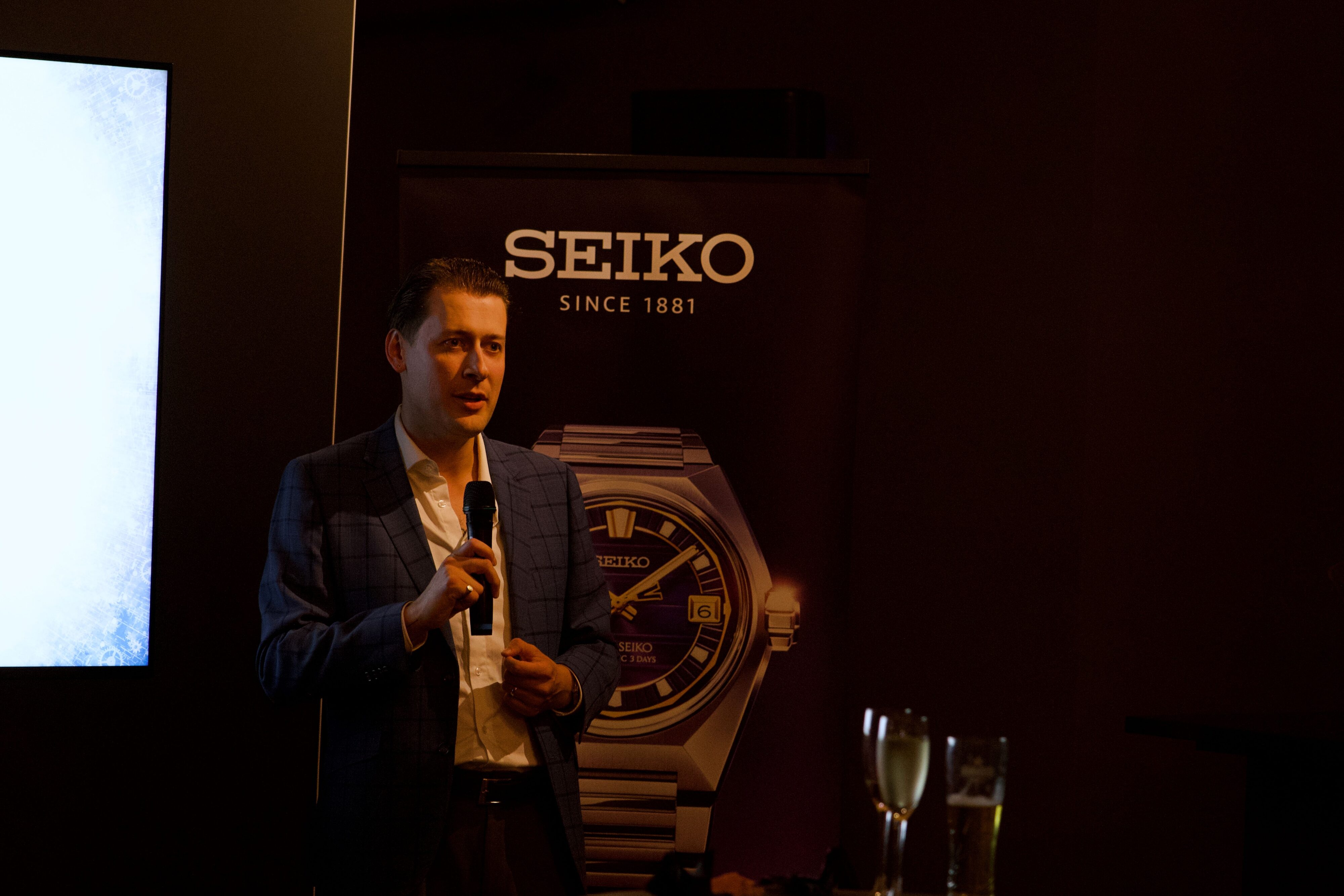 A photo of Liam Sew-Hoy (Seiko New Zealand) speaking at the Zealand launch of the King Seiko Vanac at Otto Restaurant on K' Road.