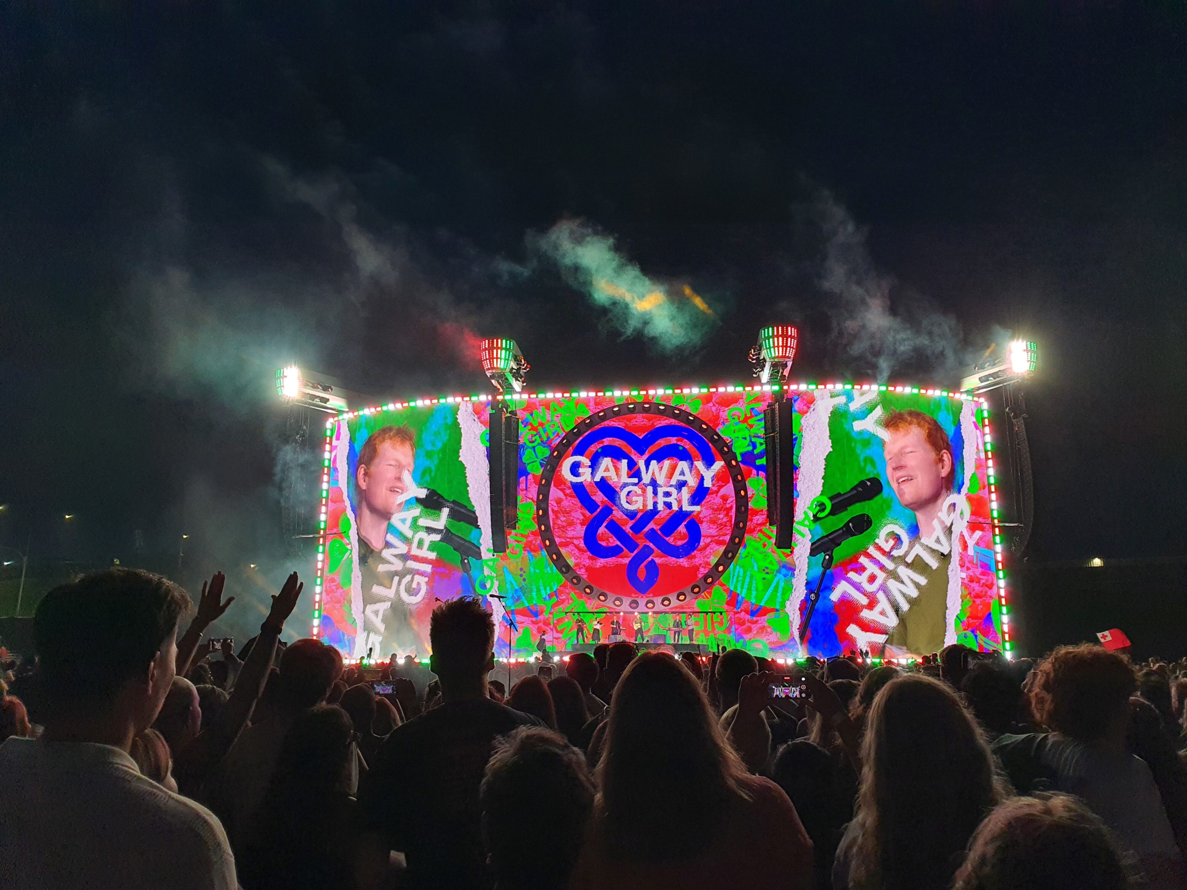 Photo of Ed Sheeran performing 'Galway Girl' on stage during the 2026 Loop Tour at Go Media Stadium in Auckland, New Zealand.
