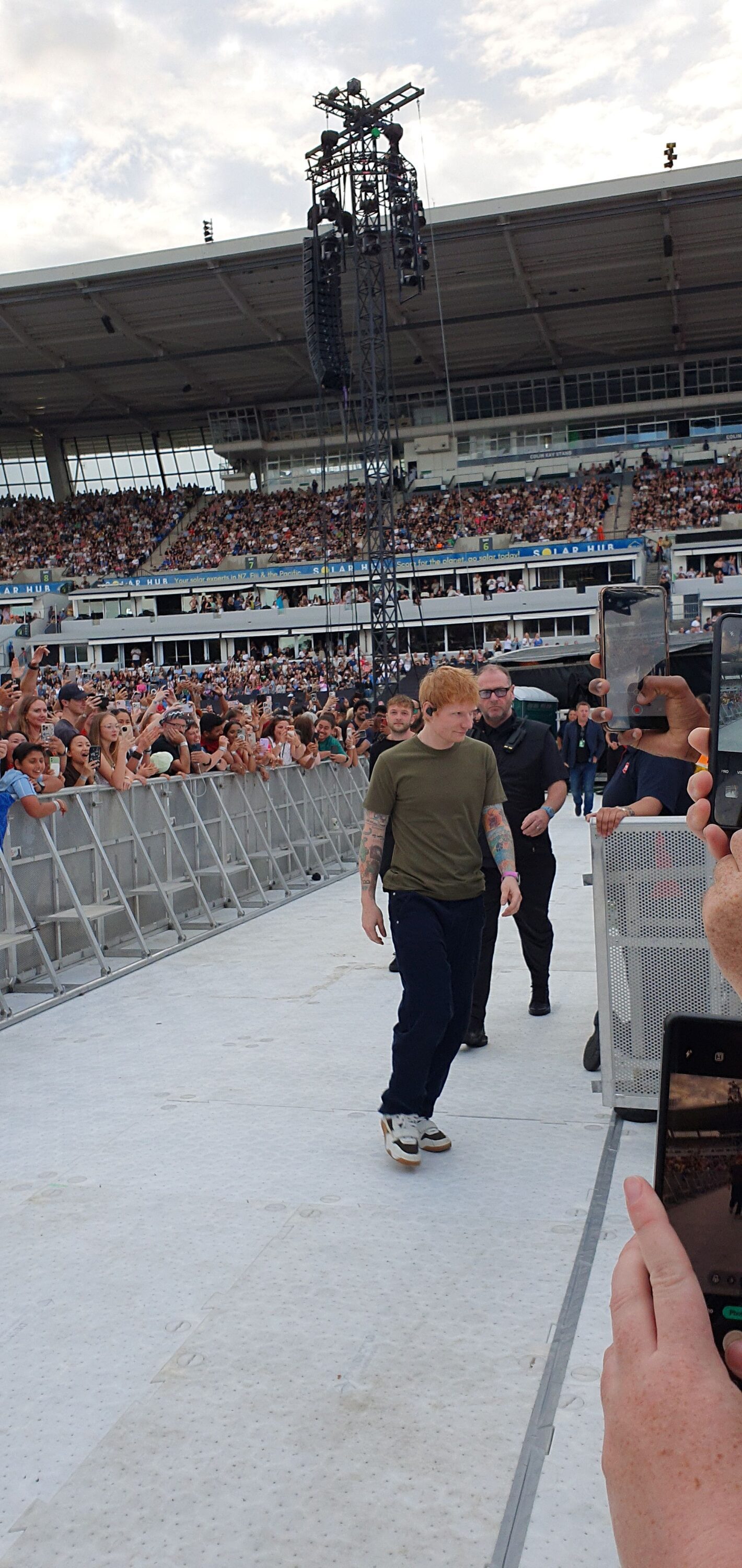 Photo of Ed Sheeran walking on stage at the start of the 2026 Loop Tour at Go Media Stadium in Auckland, New Zealand.