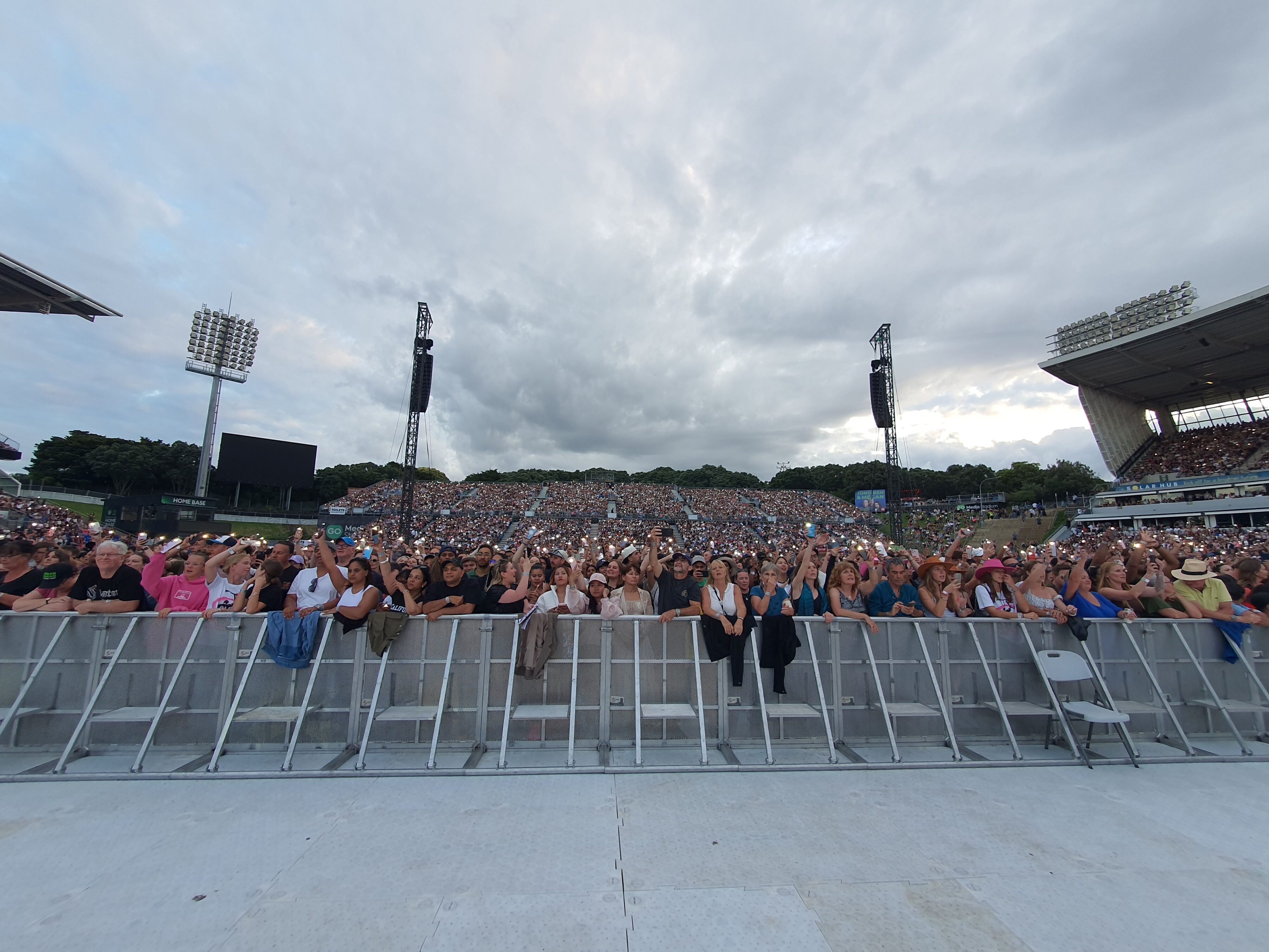 Photo of the crowd with their phone torches on during Ed Sheeran's 2026 Loop Tour at Go Media Stadium in Auckland, New Zealand.