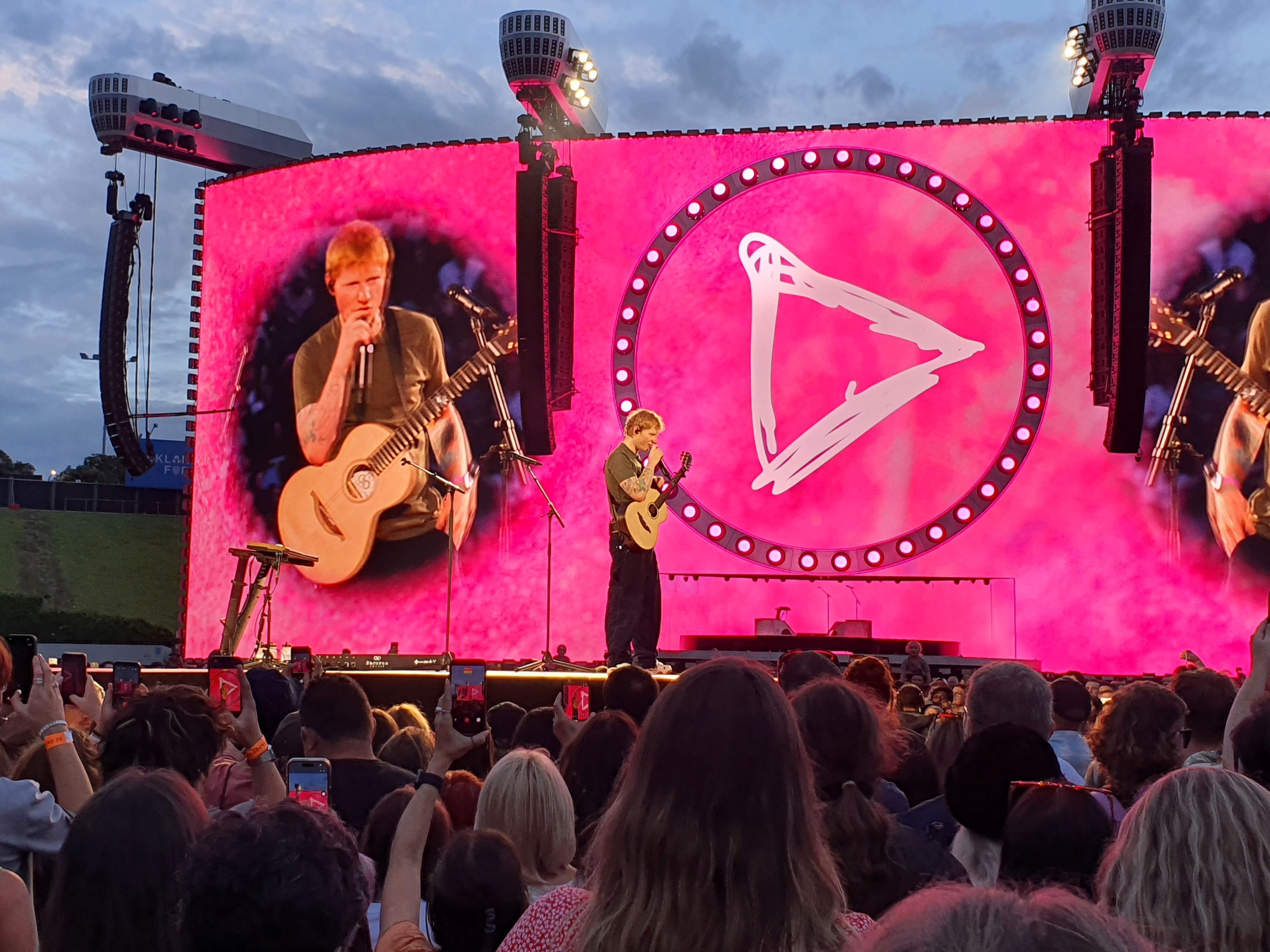 Photo of Ed Sheeran performing on stage during the 2026 Loop Tour at Go Media Stadium in Auckland, New Zealand.