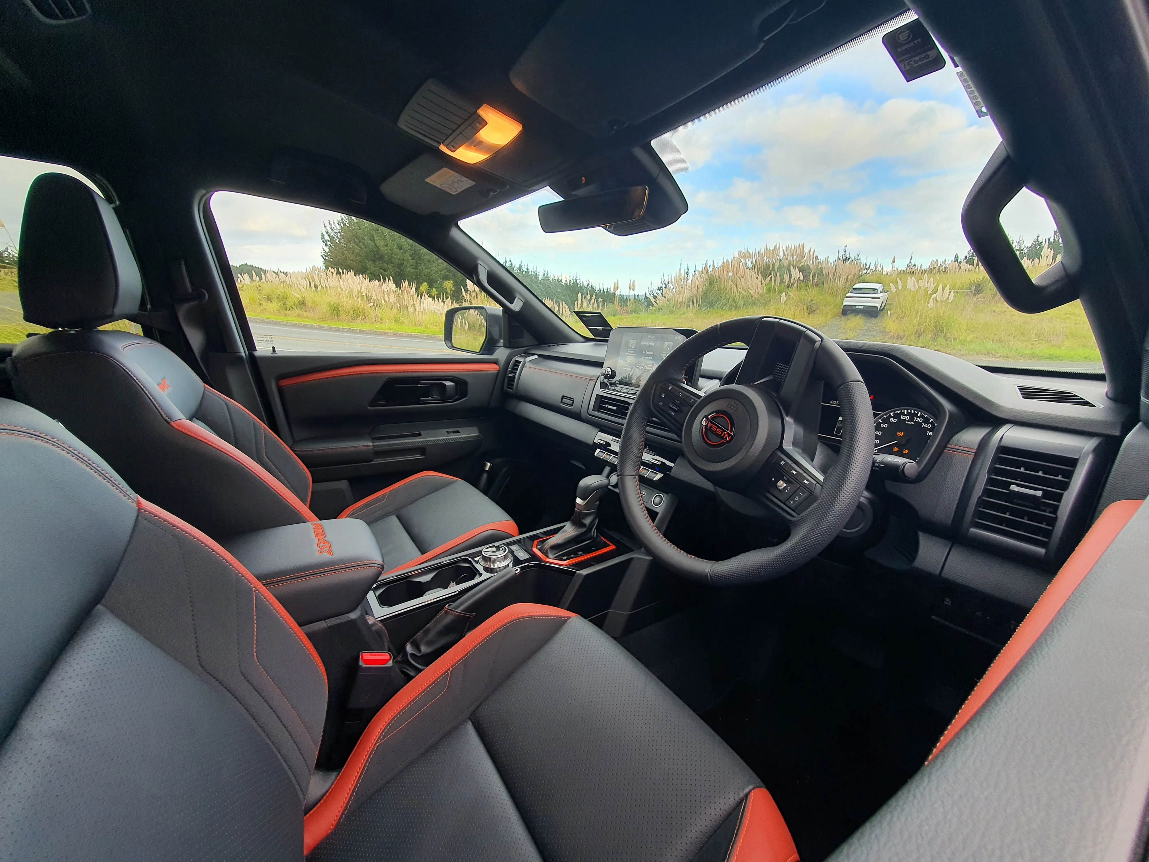Interior/cockpit view of a 2026 Nissan Navara Pro-4X.