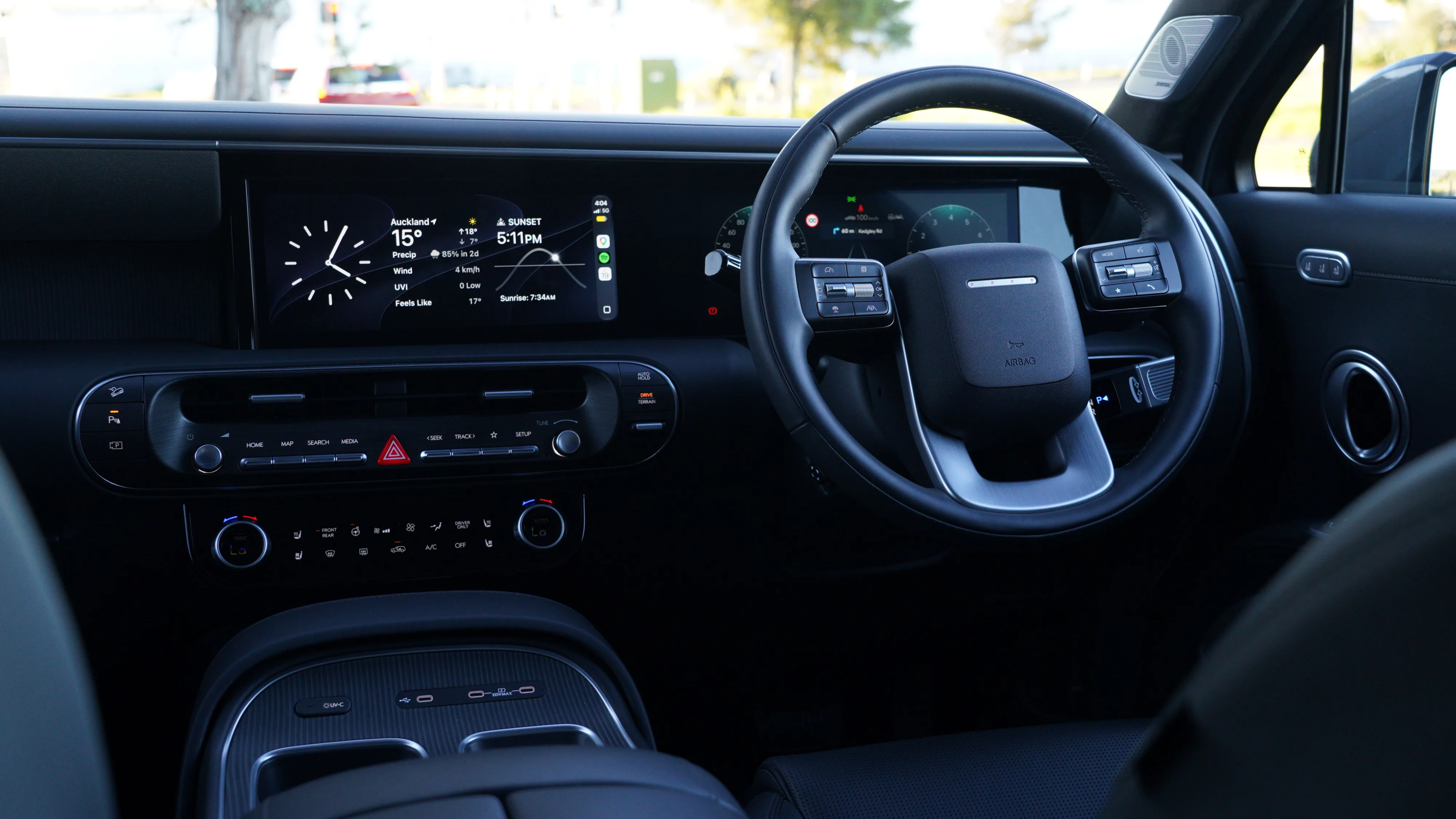 Photo of the steering wheel and dashboard on the inside of a 2026 Hyundai Palisade Calligraphy Hybrid with the Obsidian Black Nappa Leather option.