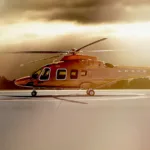 A photo of the 'Lexus Flight' helicopter on a helipad.
