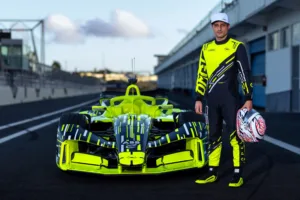 Mitch Evans posing with the Opel GSE Formula E racecar.