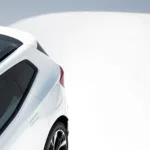 A teaser image of the rear three quarters of Polestar's new 4 SUV in white.