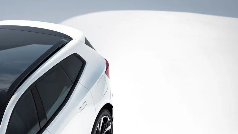 A teaser image of the rear three quarters of Polestar's new 4 SUV in white.