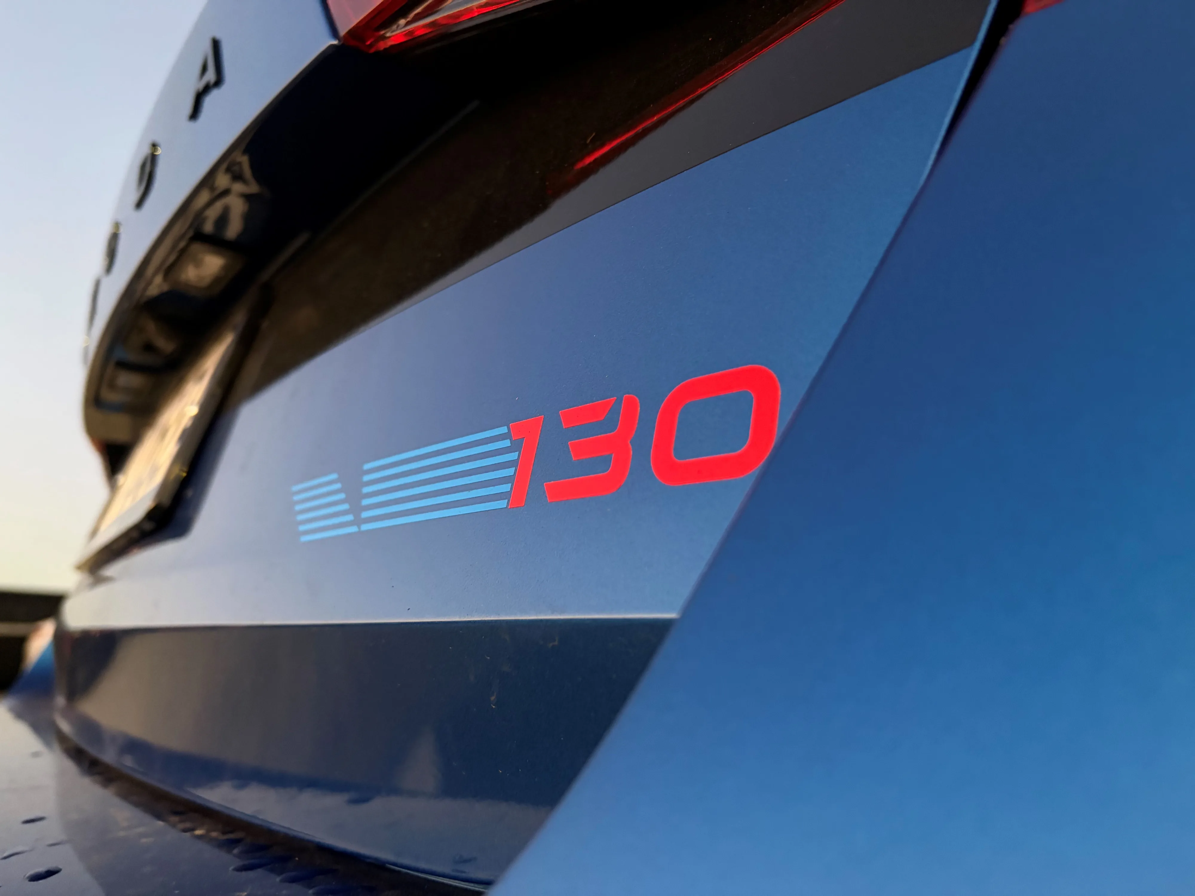 Close-up of the 130 sticker on the rear of a 2026 Skoda Fabia 130 in Race Blue Metalic.