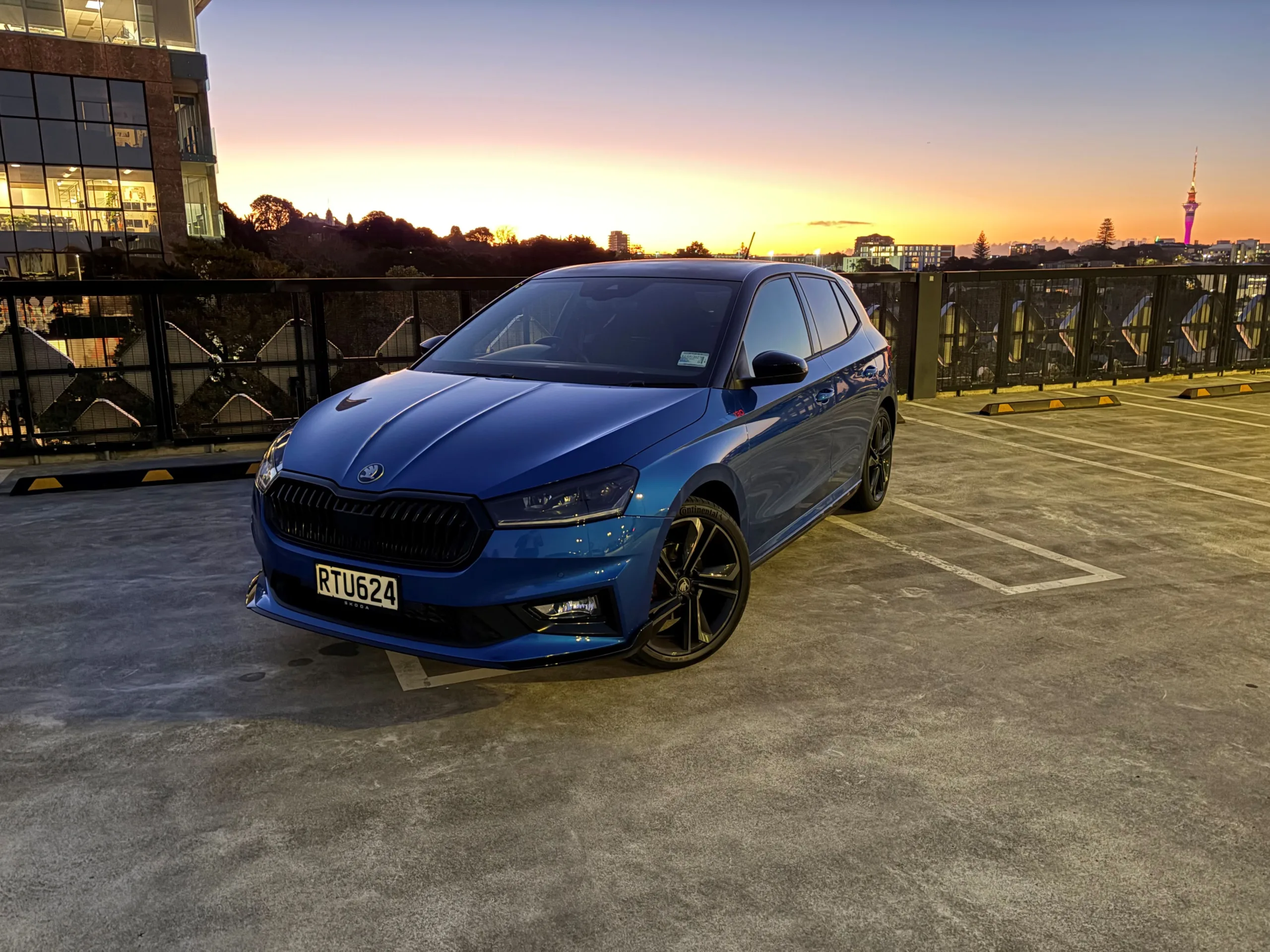 Front three quarters view of a 2026 Skoda Fabia 130 in Race Blue Metallic with a Black Magic Pearl roof.
