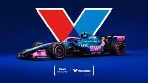 A photo of the BWT Alpine F1 Team Car against the backdrop of the Valvoline logo.