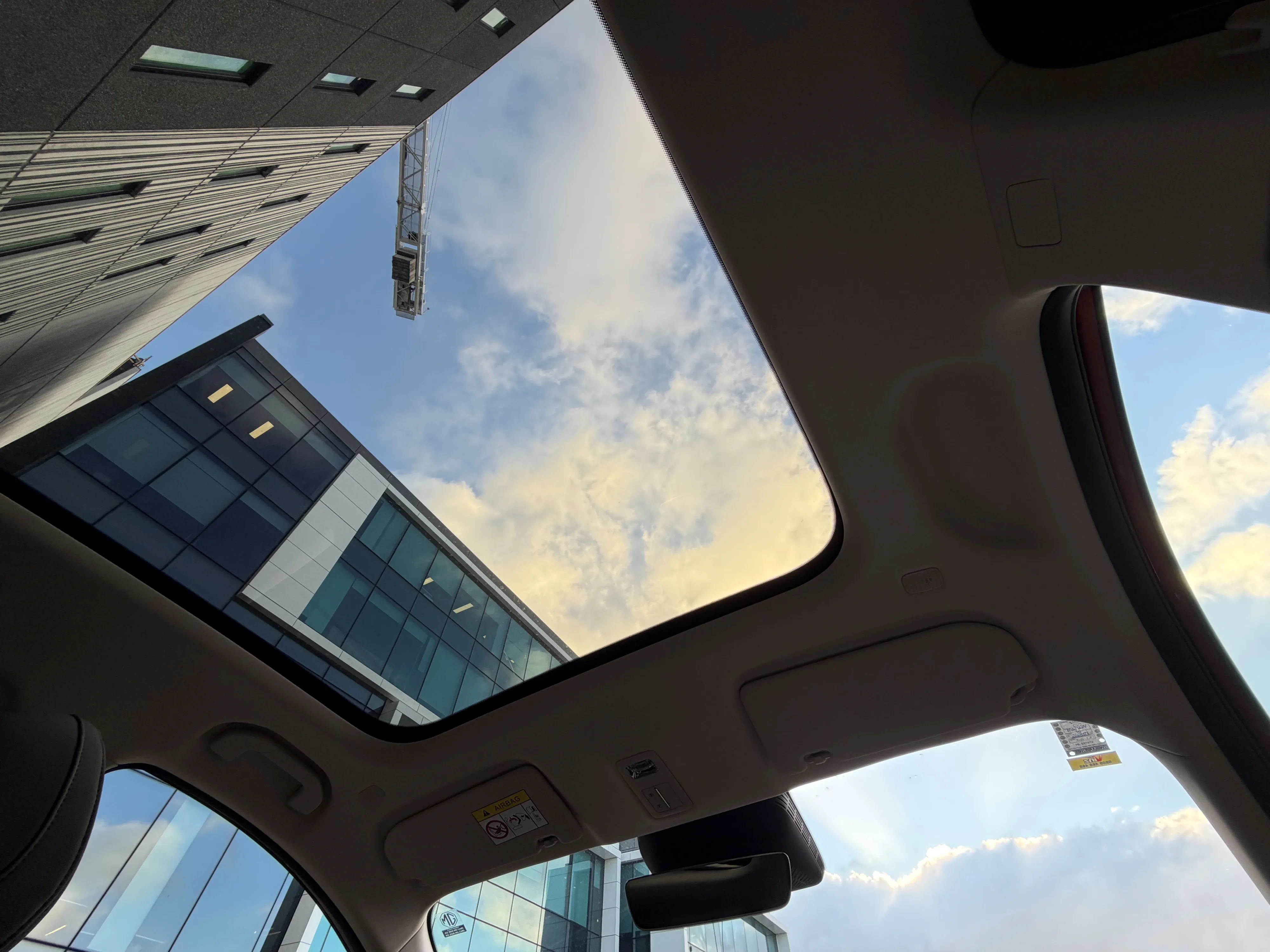 Photo of the glass panoramic roof on a 2026 MG S6 EV AWD as viewed from the interior of the car.
