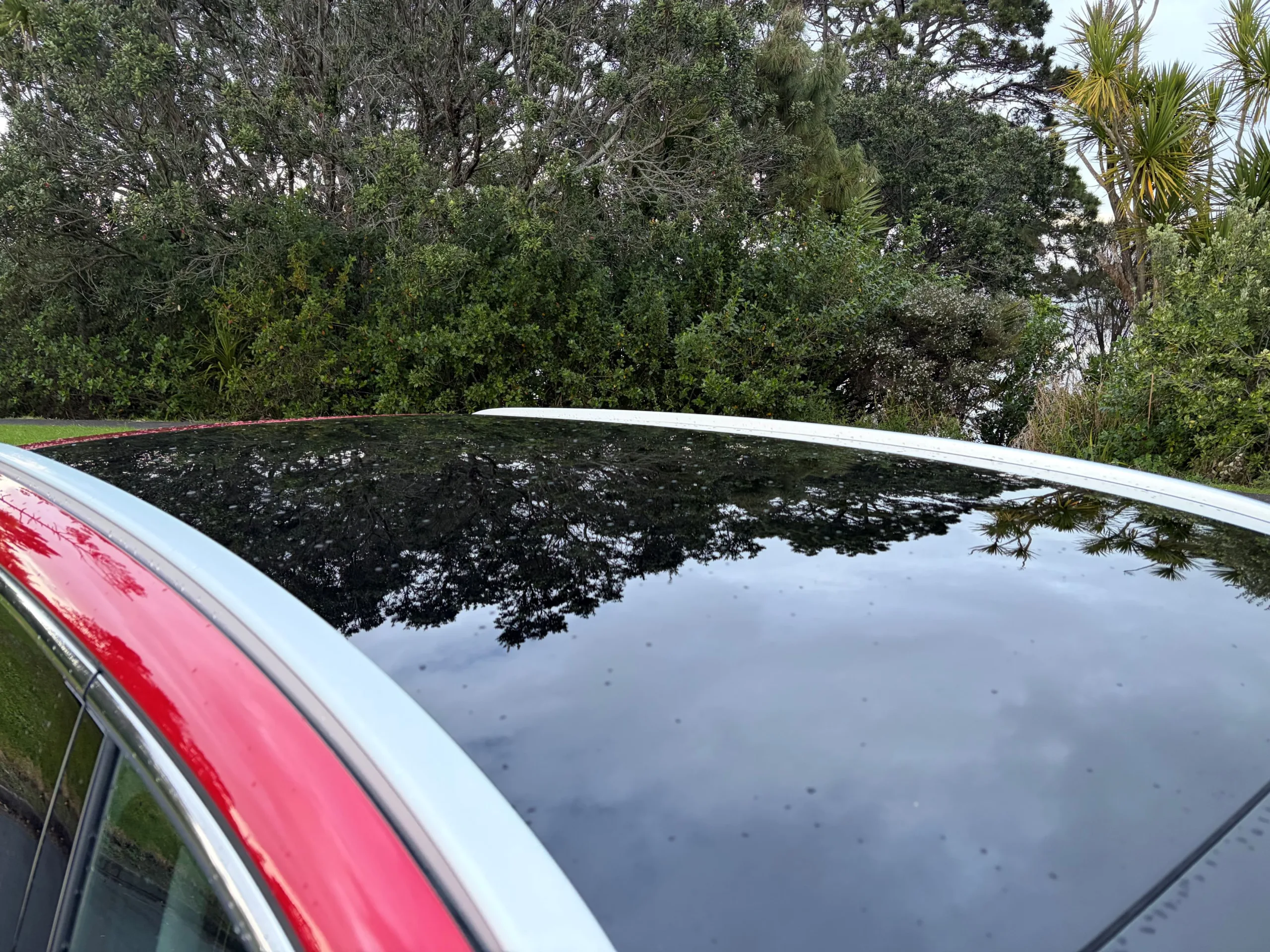 The glass panoramic roof on a 2026 MG S6 EV AWD as viewed from above.