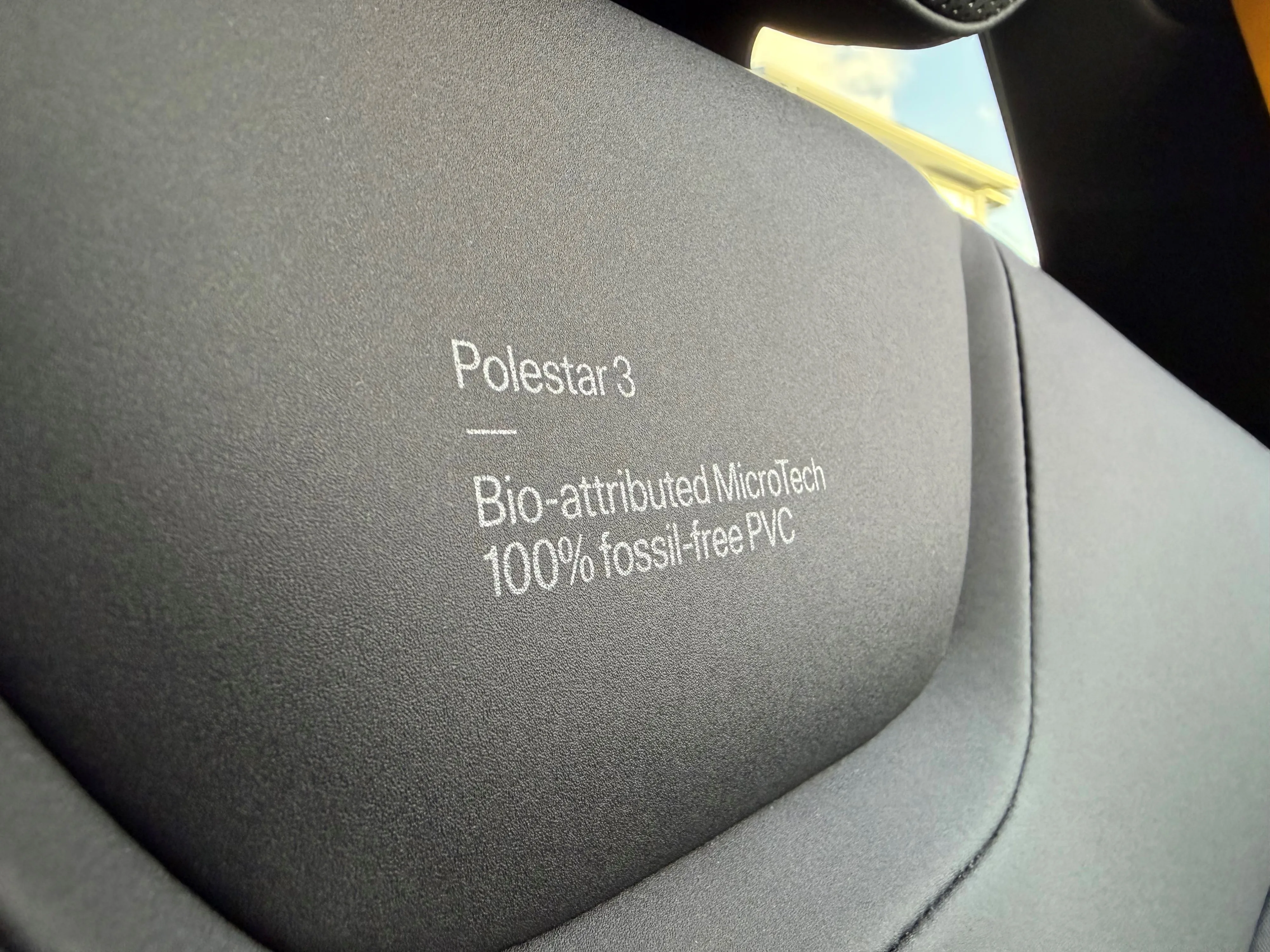 Close-up of the 'Bio-attributed MicroTech' interior upholstery on the inside of a 2026 Polestar 3 Performance.