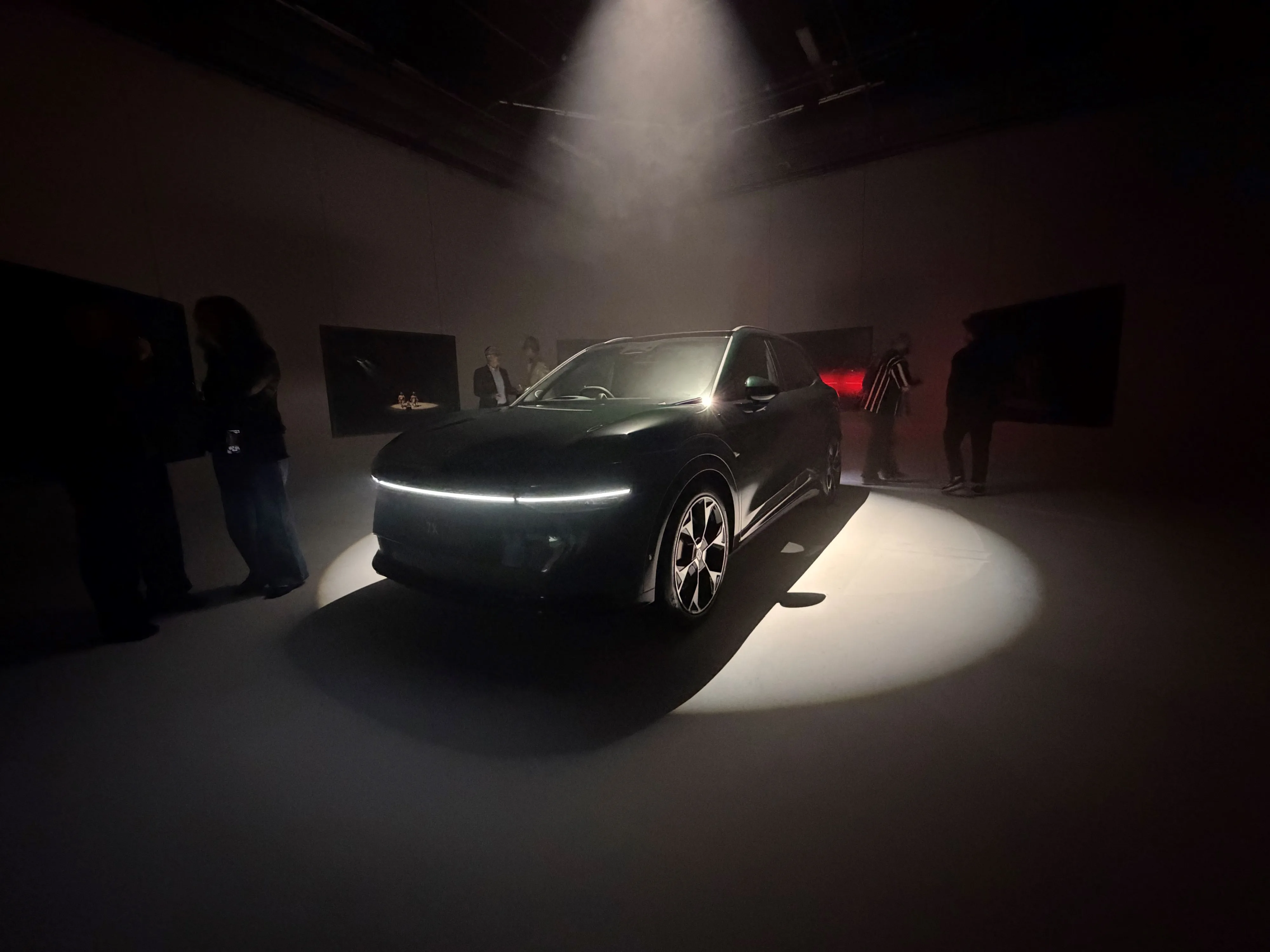 Photo of a green Zeekr 7X inside Ponsonby's Studio 230 as part of Taika Waititi's photography exhibition.