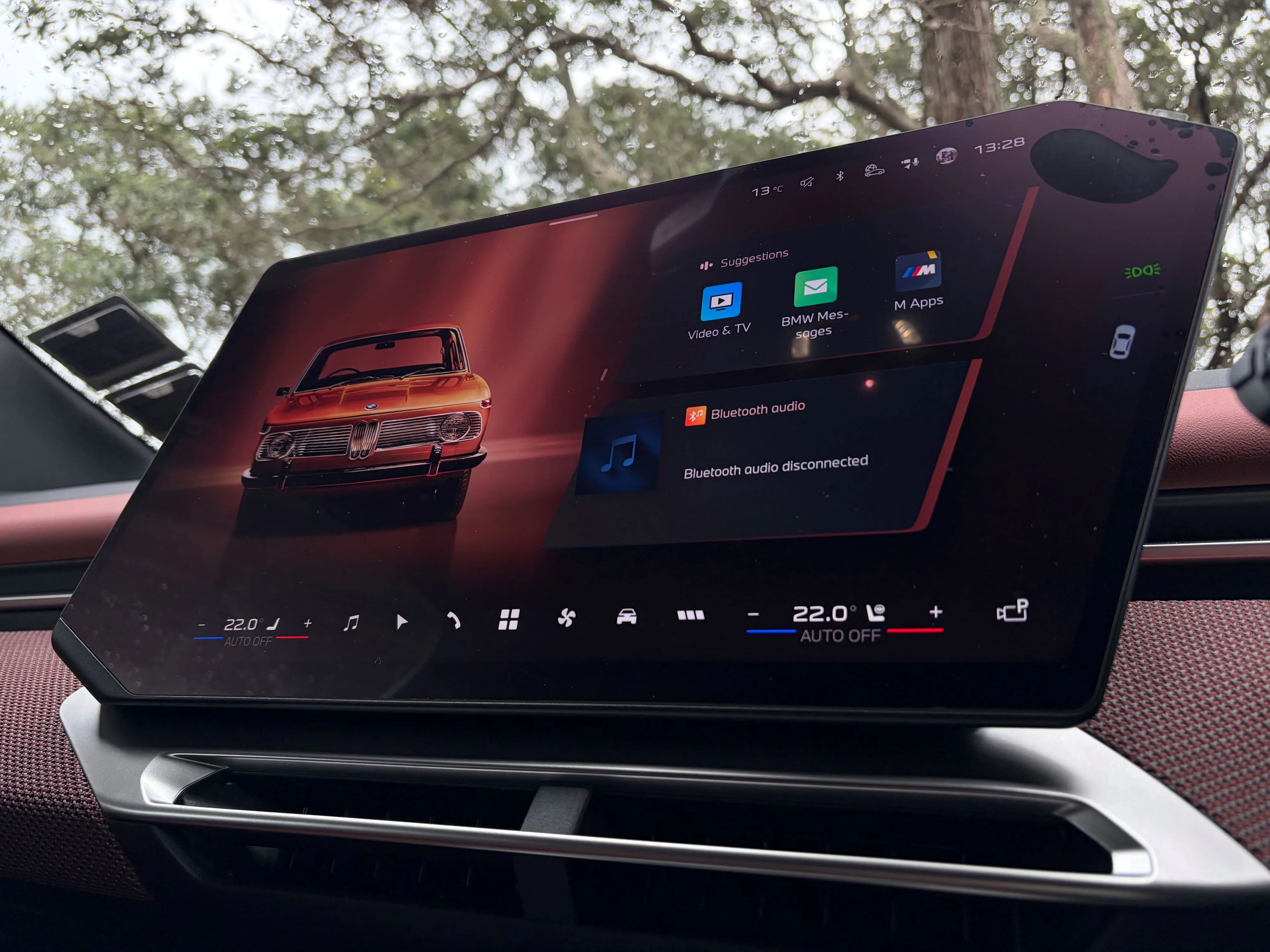 Photo of the infotainment screen on the inside of a 2026 BMW iX3 50.