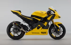 Side on photo of the Onitsuka Tiger Honda Mid Sports Concept Motorbike in yellow.